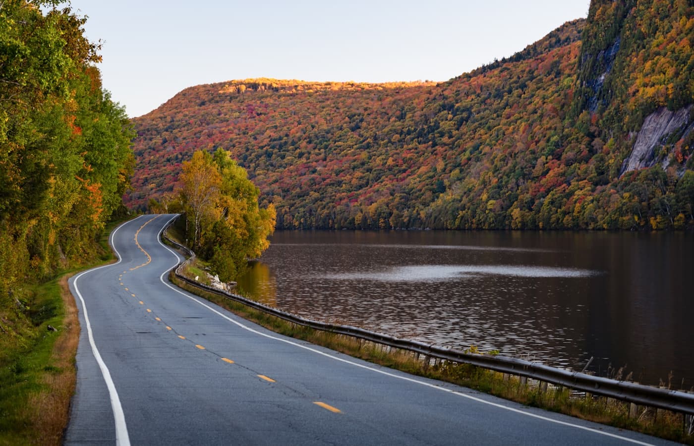 The shore road through autumn foliage